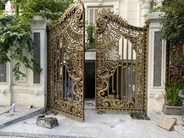 Đồng T&acirc;m JSC thi c&ocirc;ng cửa mở c&aacute;nh tự động trọn g&oacute;i